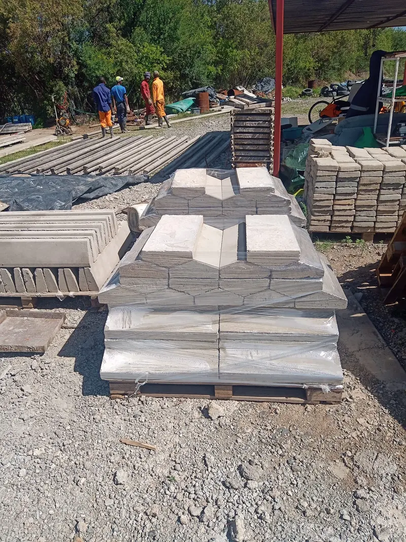 Precast concrete wall coping units stacked on a pallet