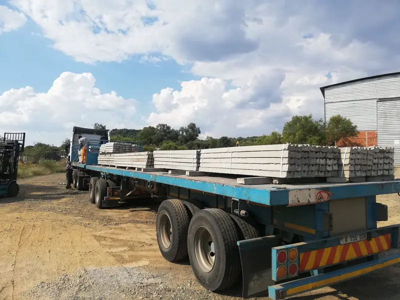Truck loaded with precast concrete lintels ready for delivery from Lintels at Bloem in Bloemfontein